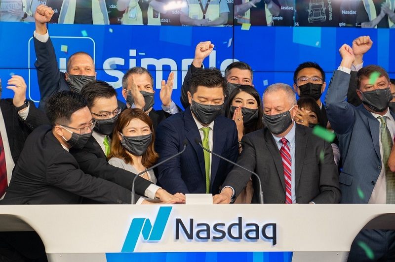Chuck Price with members of TuSimple at the Nasdaq Opening Ceremony.