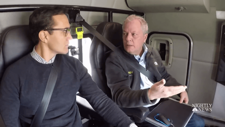 Chuck Price sits with NBC Nightly News reporter Gadi Schwartz in the back of an autonomous truck.
